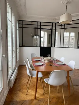 Télévision ou salle de divertissement dans l'établissement L'Appartement Corentin