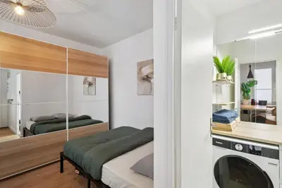 Un ou plusieurs lits dans un hébergement de l'établissement Paris Studio near Eiffel Tower - Metro 6, 8, 12