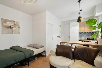 Un ou plusieurs lits dans un hébergement de l'établissement Paris Studio near Eiffel Tower - Metro 6, 8, 12