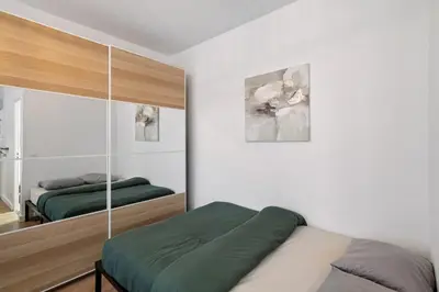 Un ou plusieurs lits dans un hébergement de l'établissement Paris Studio near Eiffel Tower - Metro 6, 8, 12