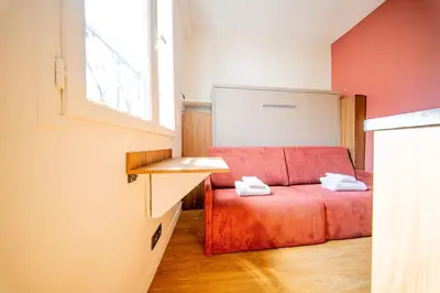 Un ou plusieurs lits dans un hébergement de l'établissement Cute Red Studio - Reaumur Sebastopol