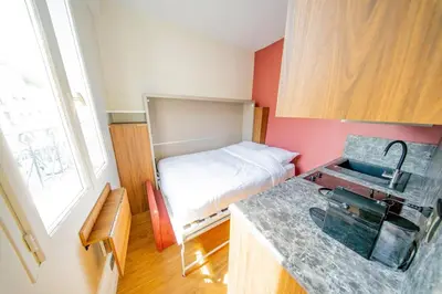 Cuisine ou kitchenette dans l'établissement Cute Red Studio - Reaumur Sebastopol
