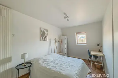 Un ou plusieurs lits dans un hébergement de l'établissement Beautiful 3-room apartment Paris 1st