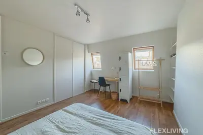 Un ou plusieurs lits dans un hébergement de l'établissement Beautiful 3-room apartment Paris 1st