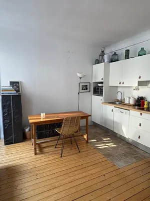 Cuisine ou kitchenette dans l'établissement Charming apartment Trocadéro Eiffel Tower