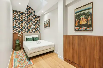 Un ou plusieurs lits dans un hébergement de l'établissement Appartement Central - 4BR 10P - Proche du Louvre