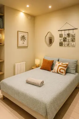 Un ou plusieurs lits dans un hébergement de l'établissement Casa Home - Large two-bedroom near Gare de Lyon
