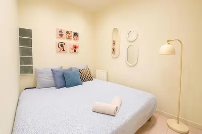 Un ou plusieurs lits dans un hébergement de l'établissement Casa Home - Large two-bedroom near Gare de Lyon