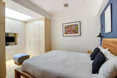 Un ou plusieurs lits dans un hébergement de l'établissement GuestReady - Lovely family getaway near The Louvre