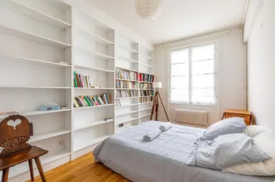 Un ou plusieurs lits dans un hébergement de l'établissement GuestReady - Homely near Montparnasse Tower