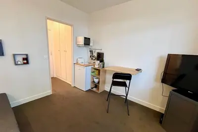 Cuisine ou kitchenette dans l'établissement Bright studio near the Parc des Princes
