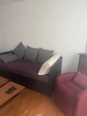 Coin salon dans l'établissement Cute appartement