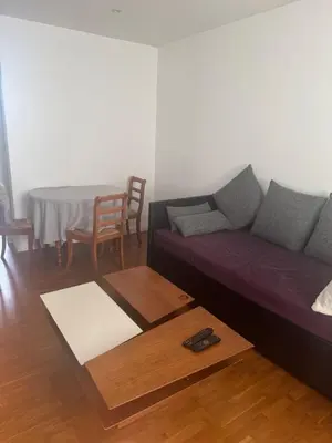 Coin salon dans l'établissement Cute appartement