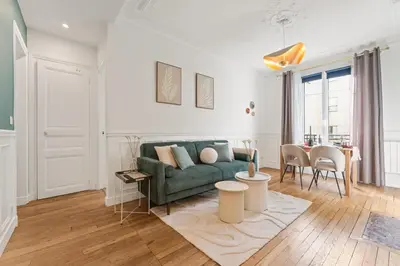 Coin salon dans l'établissement Square Danton Two Bedrooms 5 people