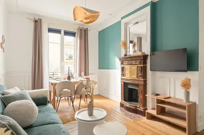 Coin salon dans l'établissement Square Danton Two Bedrooms 5 people