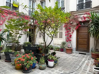 Jardin de l'établissement Duplex d'exception et atypique à Montmartre