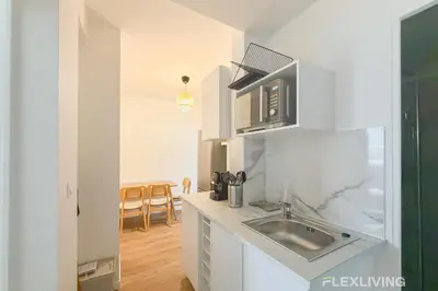 Cuisine ou kitchenette dans l'établissement Ideal T5 in the 15th district of Paris