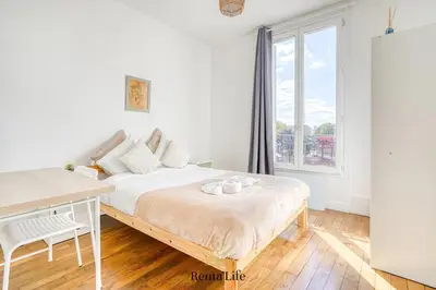 Un ou plusieurs lits dans un hébergement de l'établissement Asnièrois Concorde - T3 - 10 min Paris