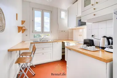 Cuisine ou kitchenette dans l'établissement Asnièrois Concorde - T3 - 10 min Paris