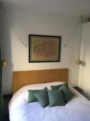 Un ou plusieurs lits dans un hébergement de l'établissement Marais-Bretagne Lovely One Bedroom