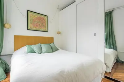 Un ou plusieurs lits dans un hébergement de l'établissement Marais-Bretagne Lovely One Bedroom