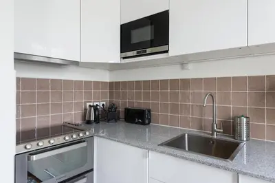 Cuisine ou kitchenette dans l'établissement Marais-Bretagne Lovely One Bedroom