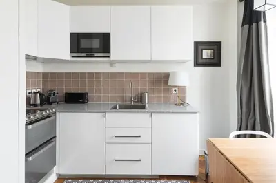 Cuisine ou kitchenette dans l'établissement Marais-Bretagne Lovely One Bedroom