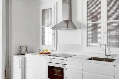 Cuisine ou kitchenette dans l'établissement Le Marais élégant