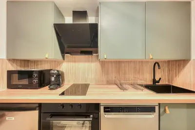 Cuisine ou kitchenette dans l'établissement Elegant studios in Malakoff next to Paris
