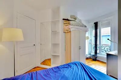 Un ou plusieurs lits dans un hébergement de l'établissement Loft spacieux et lumineux - Paris