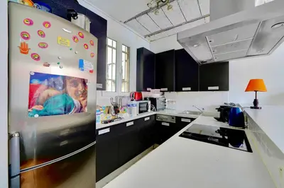 Cuisine ou kitchenette dans l'établissement Loft spacieux et lumineux - Paris