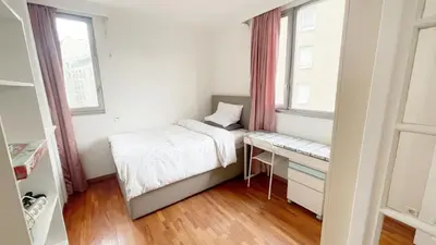 Un ou plusieurs lits dans un hébergement de l'établissement Apartment La Seine-Free Parking