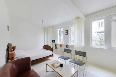 Un ou plusieurs lits dans un hébergement de l'établissement Cozy Studio 2P – Montmartre