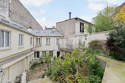 Jardin de l'établissement Cozy Studio 2P – Montmartre