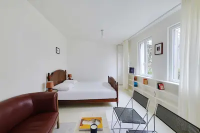 Un ou plusieurs lits dans un hébergement de l'établissement Cozy Studio 2P – Montmartre