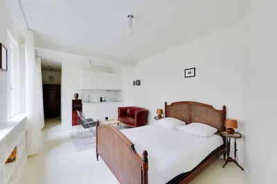 Un ou plusieurs lits dans un hébergement de l'établissement Cozy Studio 2P – Montmartre