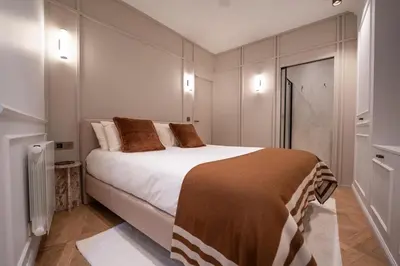 Un ou plusieurs lits dans un hébergement de l'établissement Architect Luxury Appartment - Marais