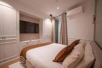 Un ou plusieurs lits dans un hébergement de l'établissement Architect Luxury Appartment - Marais