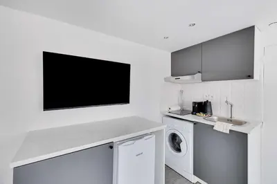 Cuisine ou kitchenette dans l'établissement Cozy Studio A C 2P - Sentier