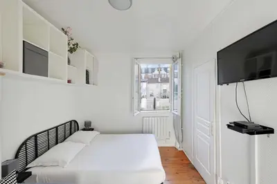 Télévision ou salle de divertissement dans l'établissement Elegant Studio 2P – Paris 14