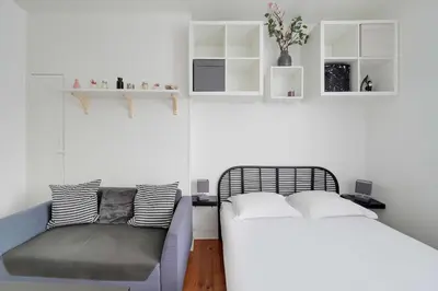 Un ou plusieurs lits dans un hébergement de l'établissement Elegant Studio 2P – Paris 14