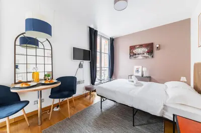 Un ou plusieurs lits dans un hébergement de l'établissement Studio Cosy Paris 5eme Vue Musee Parfait pour 2