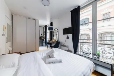 Un ou plusieurs lits dans un hébergement de l'établissement Studio Cosy Paris 5eme Vue Musee Parfait pour 2