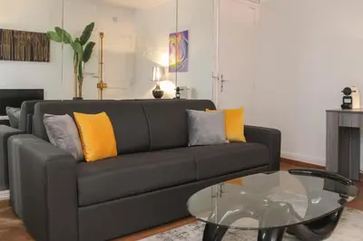 Coin salon dans l'établissement Bel appartement - Bastille Canal Saint Martin