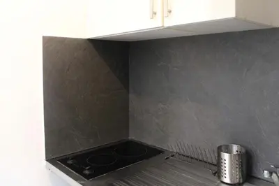 Cuisine ou kitchenette dans l'établissement Bel appartement - Bastille Canal Saint Martin
