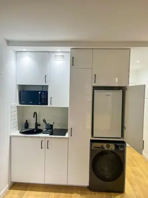 Cuisine ou kitchenette dans l'établissement Bright Apartment in Paris Convention and Paris Expo