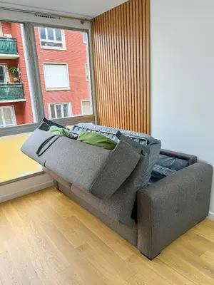 Coin salon dans l'établissement Bright Apartment in Paris Convention and Paris Expo