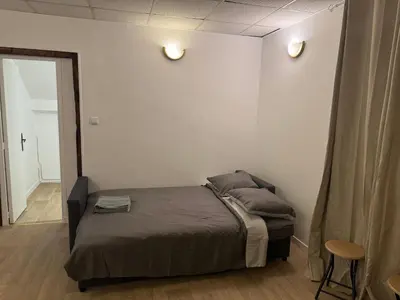 Un ou plusieurs lits dans un hébergement de l'établissement Incroyable appartement Paris Montparnasse