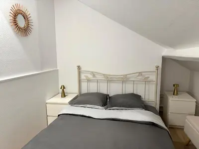 Un ou plusieurs lits dans un hébergement de l'établissement Incroyable appartement Paris Montparnasse