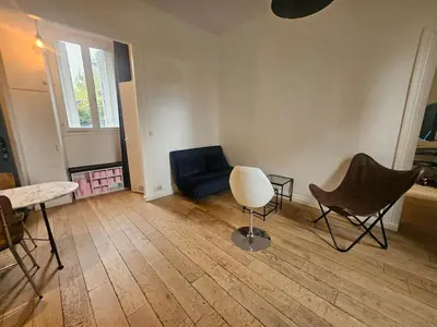 Coin salon dans l'établissement appartement aux portes de Paris